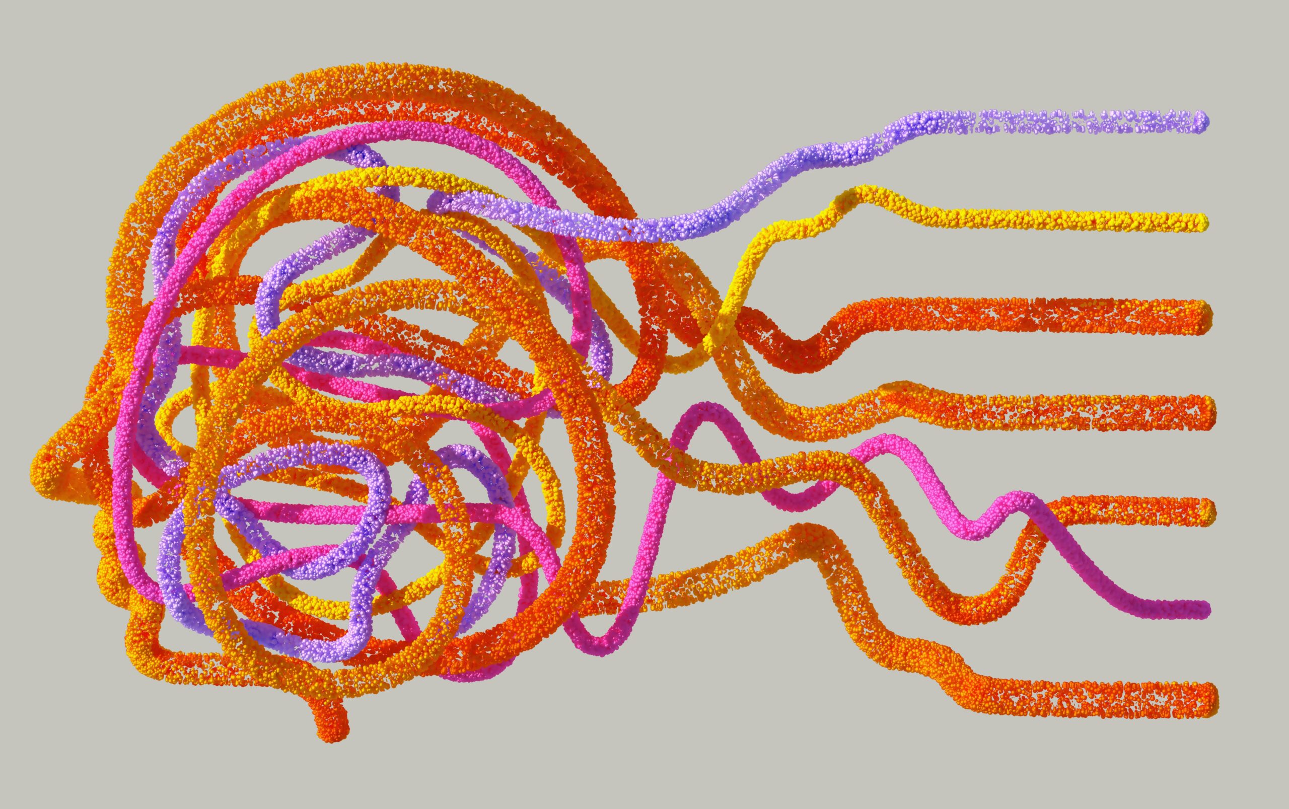 Side profile of a human head created by threads of orange, purple and yellow yarn